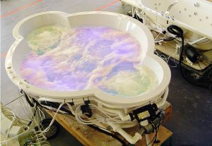 A bespoke chromotherapy bath being tested in the Cabuchon factory.